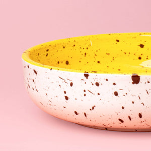 Ceramic grater plate yellow grating surface close-up