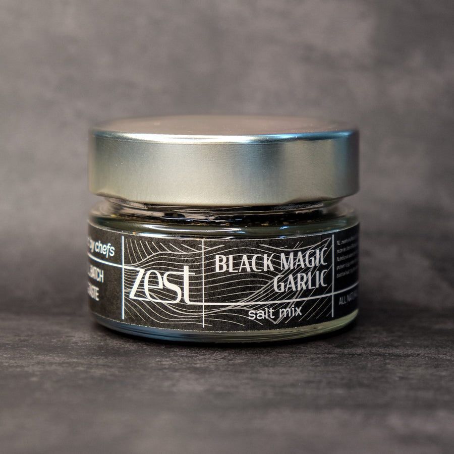 Black Magic black garlic finishing salt in glass jar with ZEST label